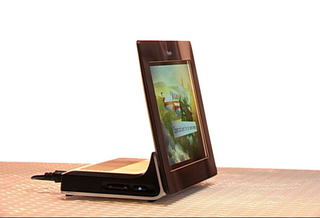 Illustration for article titled Kodak Wireless OLED Picture Frames Boast 30,000:1 Contrast Ratio